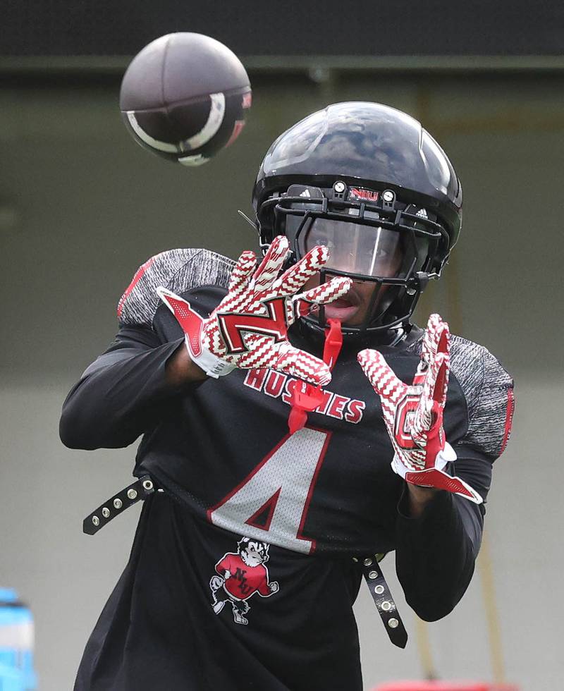 Northern Illinois University wide receiver Kenji Lewis makes a catch Tuesday, April 14, 2026, during spring practice in Huskie Stadium at NIU in DeKalb.