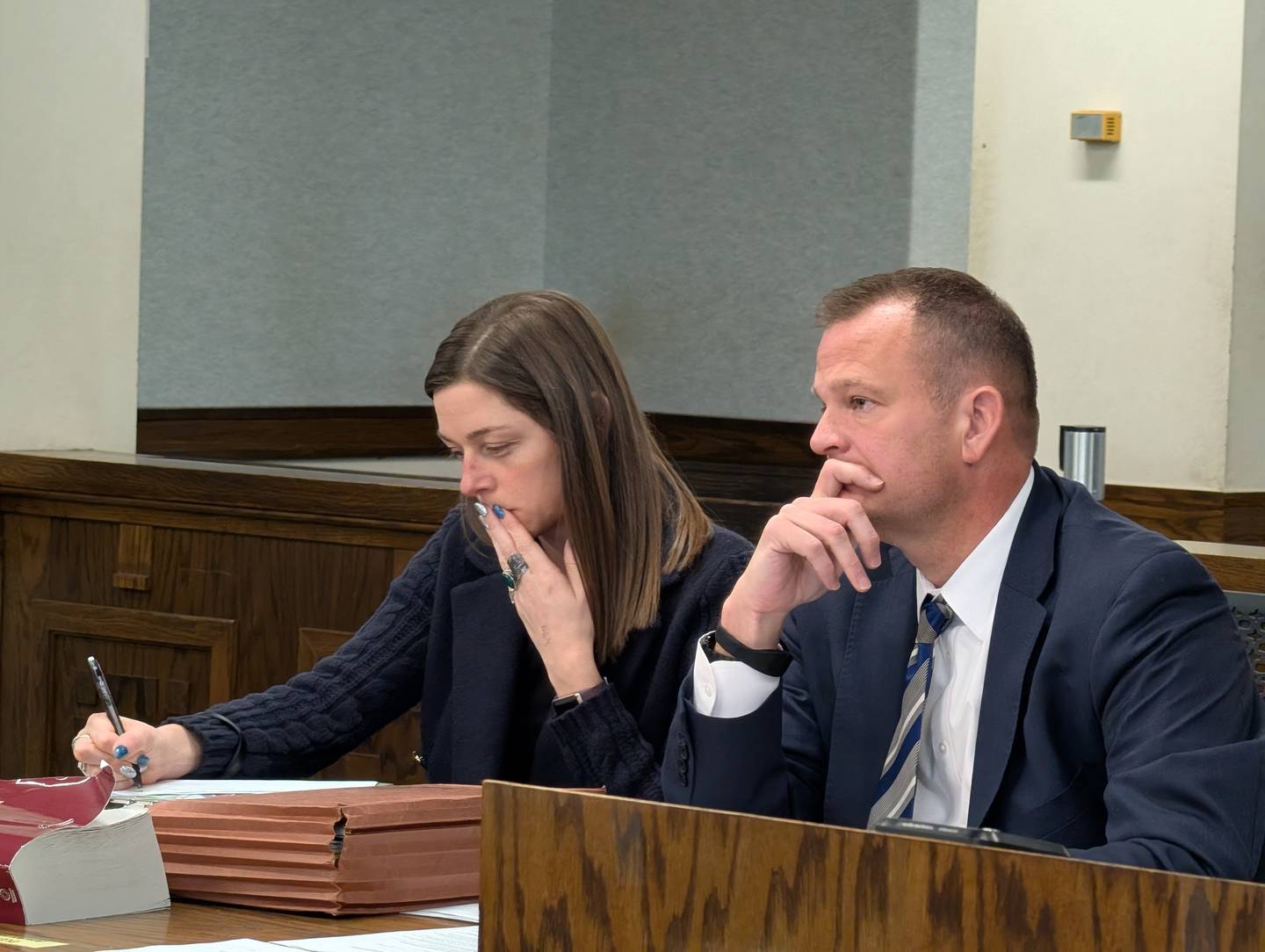Tifani Stewart, Chief of the Kankakee County State's Attorney's Office Victim and Witness Division (left) and Kankakee County State's Attorney Jim Rowe listen during a hearing Jan. 23, 2026, in the Xandria Harris case.