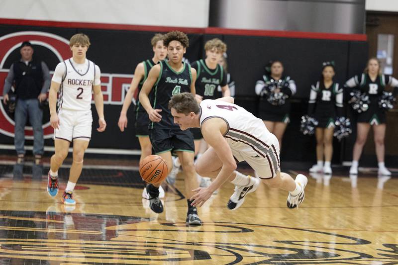 Rockridge’s Jase Whiteman saves a ball from going over the half court line against Rock Falls Wednesday, March 1, 2023 in the Orion 2A sectional semifinal.