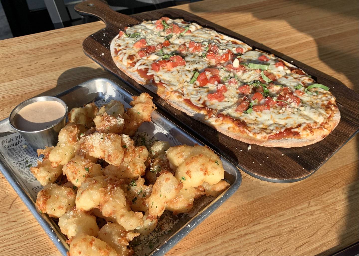 Cheese Curds served with chipotle ranch and margarita flatbread at Duke's Northwoods in St. Charles.
