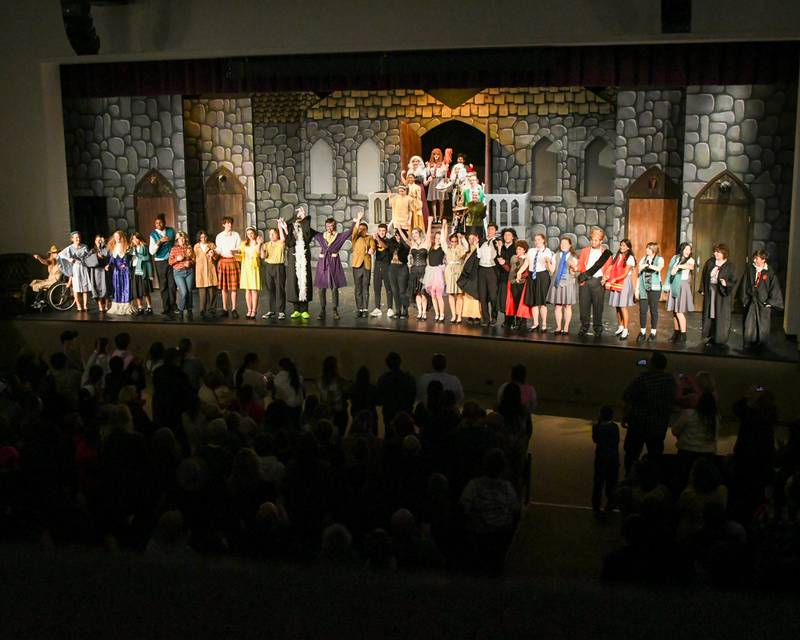 Downers Grove North’s students get a standing ovation while they take their final bows after preforming the production of Puffs on Saturday Nov. 23, 2024, held at Downers Grove North’s auditorium.