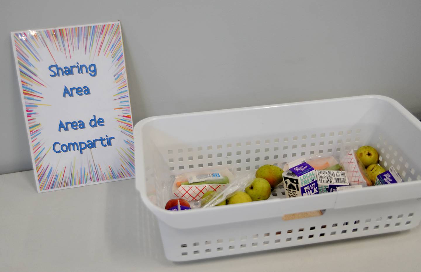 The sharing area for food that children don’t want to eat from their boxed lunches on Tuesday, June 7, 2022, at the McHenry Public Library, 809 Front St. in McHenry, during the library's free summer lunches for kids program.