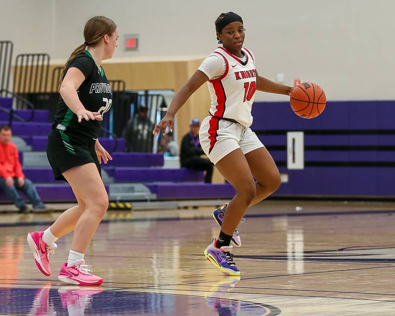 Lincoln Way Central's Kiya Newson-cole (10) makes a move at the top of the key in the WJOL Tournament Championship game. Nov 18, 2023.
