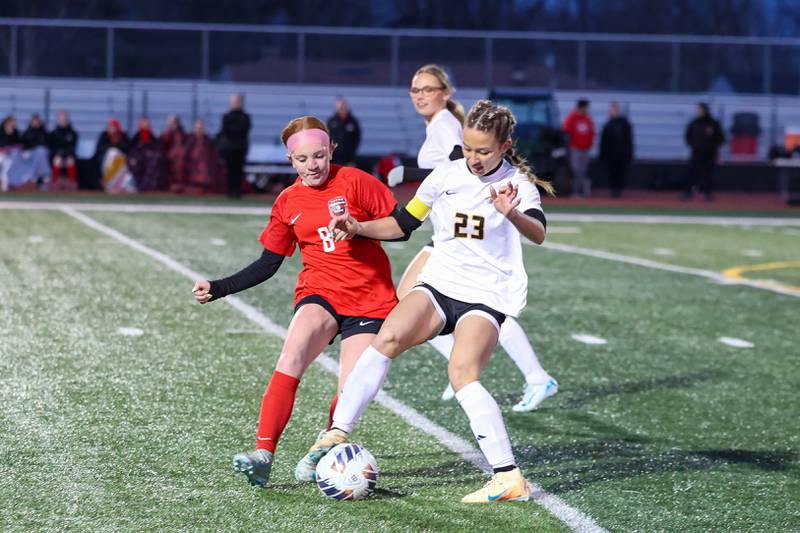 Bradley-Bourbonnais' Haven Frueling, left, defends Herscher's Sophie Venckauskas during Bradley-Bourbonnais' 4-3 victory on Monday, April 6, 2026.