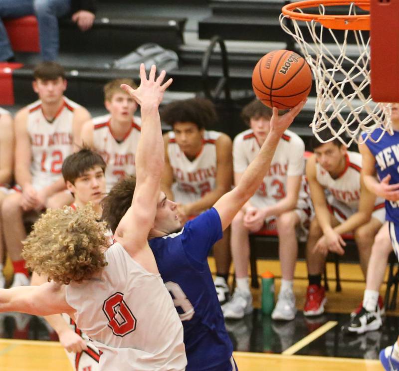 Newman's Nolan Britt drives to the hoop as Hall's Mac Resetich defends on Friday, Feb. 3, 2023 at Hall High School.