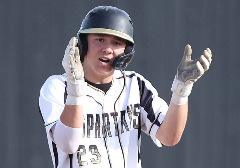 Sycamore's Kyle Hartmann applauds after hitting a double during their game against Morris Tuesday, May 9, 2023, at the Sycamore Community Sports Complex.