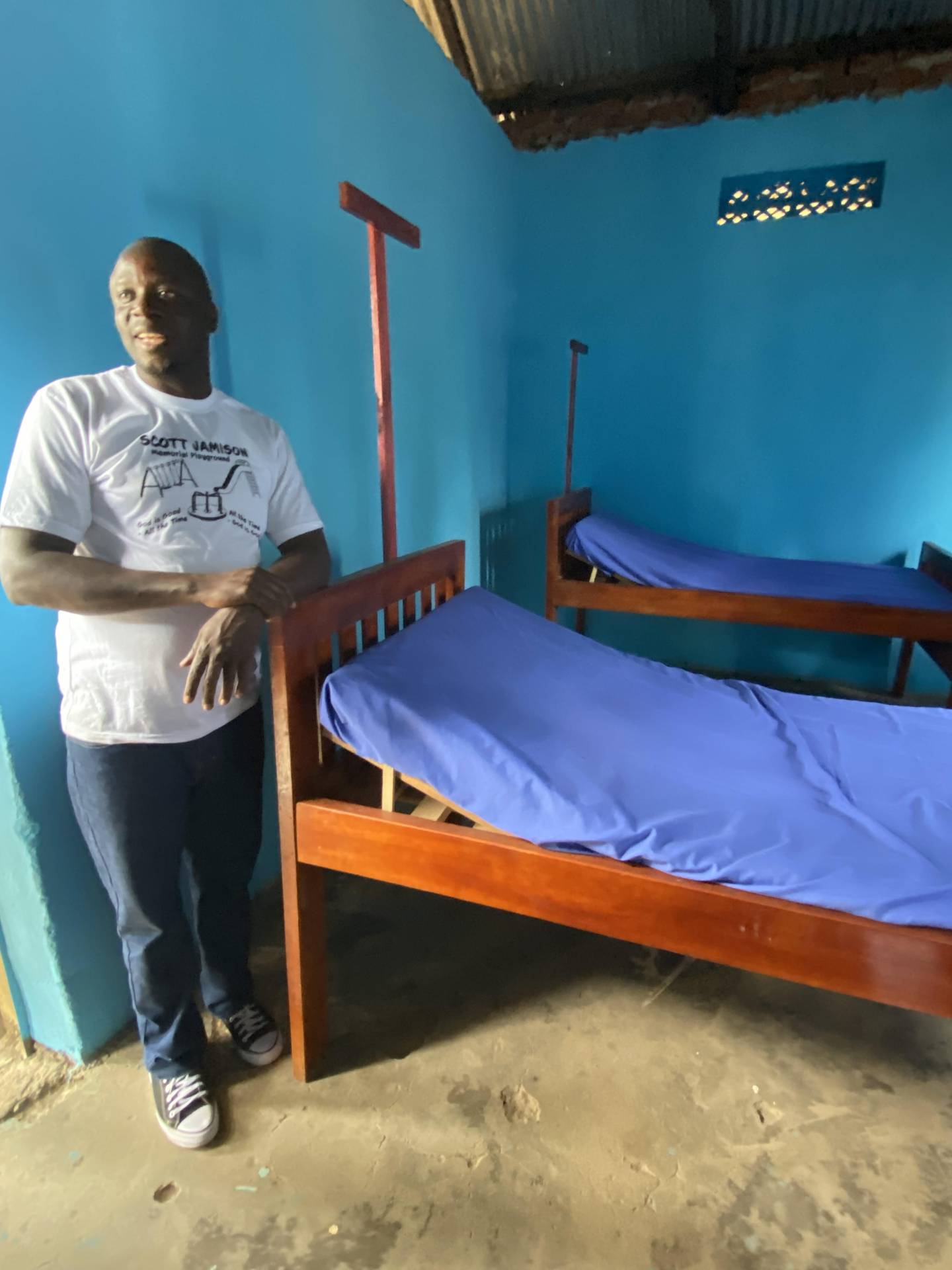 ITI’s Milton Tusingwire explains that clinic beds were constructed locally to save money.