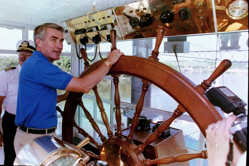 Jim Edgar candidate for Governor of Illinois, turns the captains wheel of the Spirit of Peoria paddle-wheeler on Thursday, Aug. 30, 1990 in Peru.