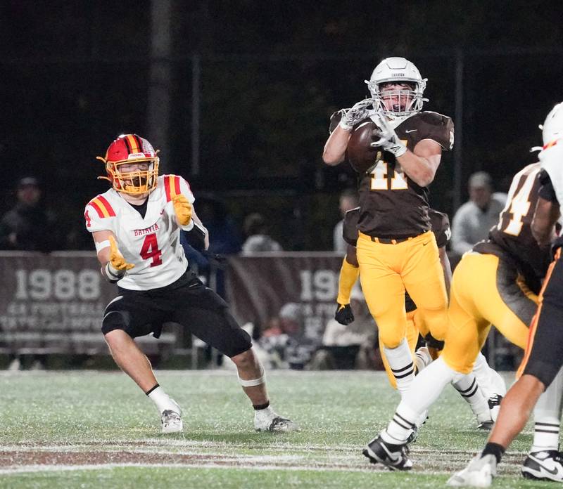 Mt. Carmel's Matthew Mucha (41) intercepts a pass against Batavia during a class 7A semifinal football playoff game at Mt. Carmel High School in Chicago on Saturday, Nov 18, 2023.