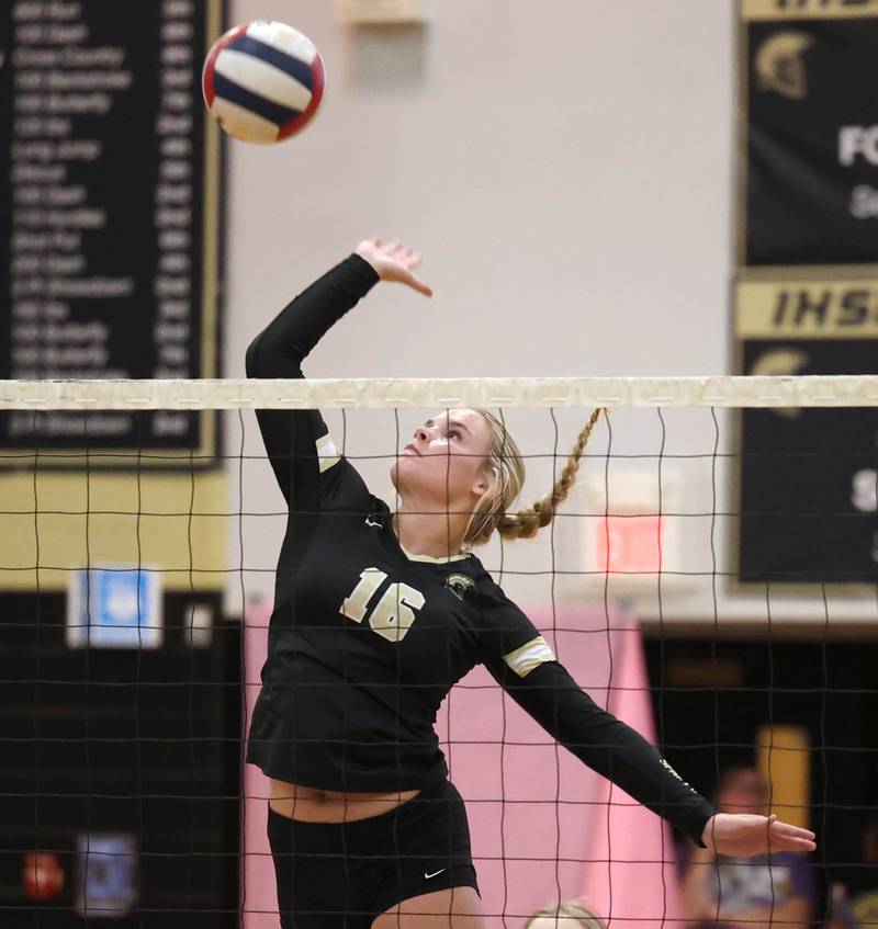 Sycamore's Jaycie Funderburg goes up for a spike during their match against DeKalb Monday, Oct. 16, 2023, at Sycamore High School.