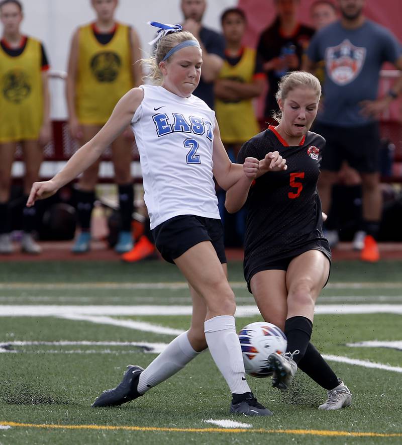 Lincoln-Way East's Kara Waishwell battles with Libertyville’s Tess McGormley for control of the ball during the IHSA Class 3A state third-place match at North Central College in Naperville on Saturday, June 3, 2023.