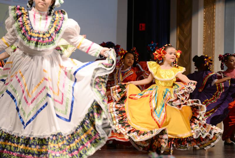 Forest Road Elementary School students including Fiona Kennedy participate in the La Grange District 102 Expo de Bellas Artes at Park Junior High School Friday, April 19, 2024.