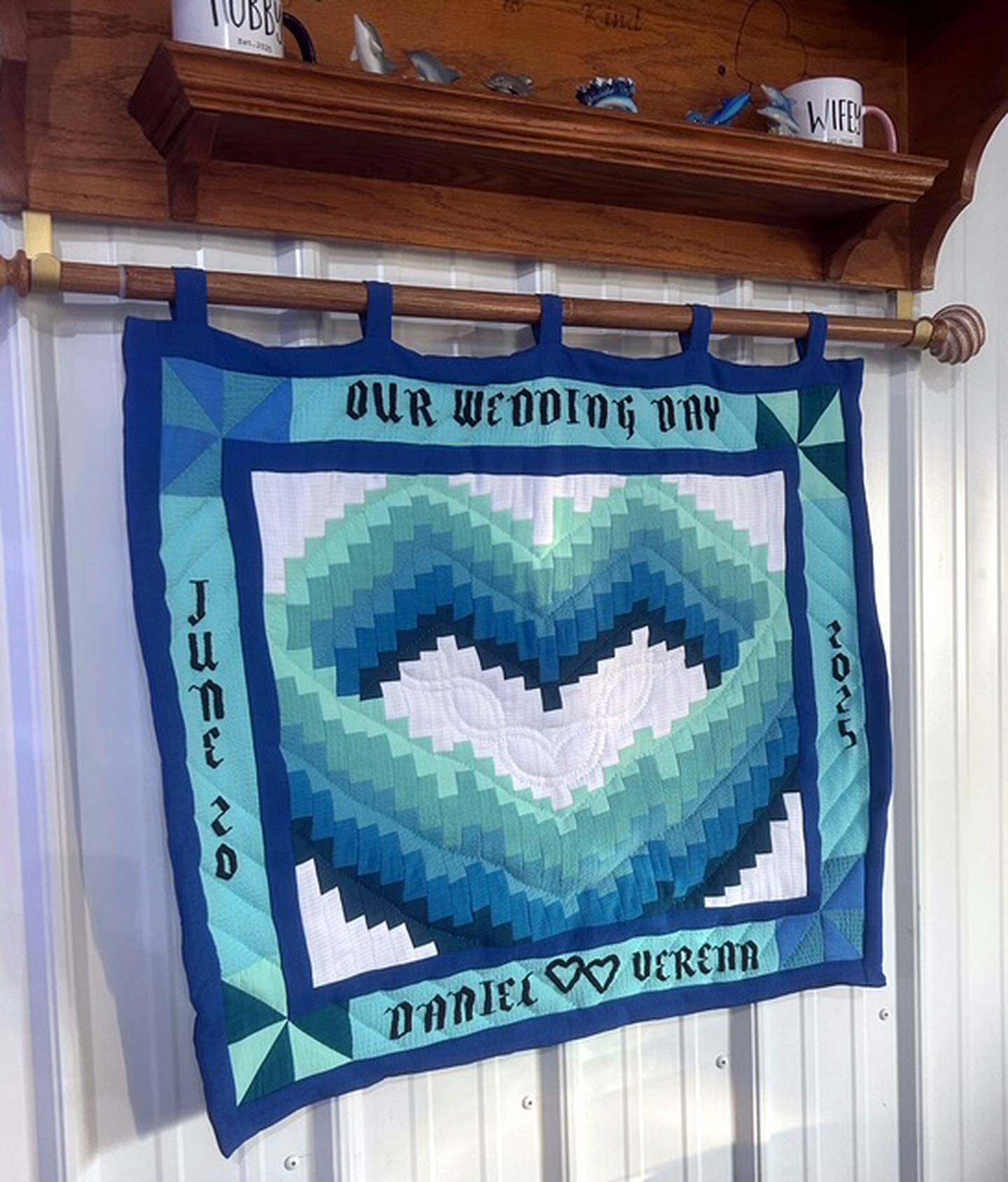 This wedding wall hanging was made from all the fabrics that were worn.