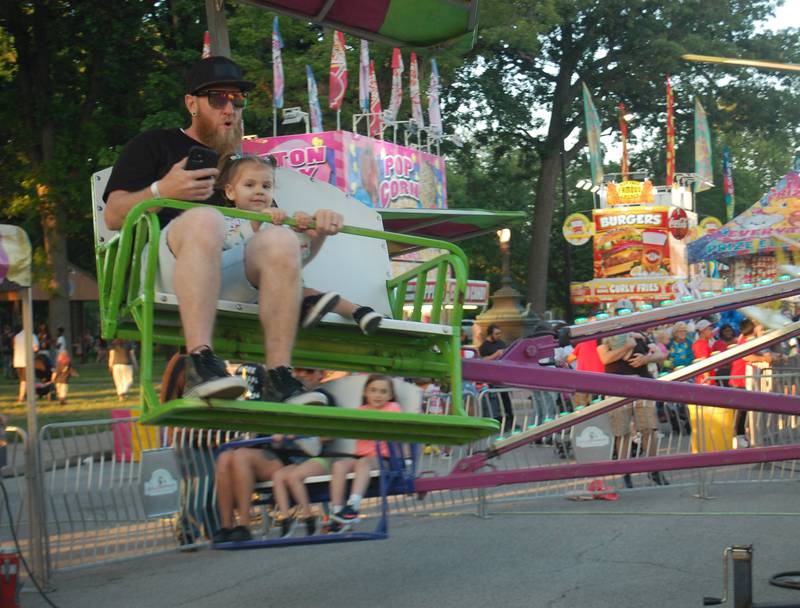 The Kite Flyer ride attracts carnivalgoers on the opening night of Park Fest Friday, May 26, 2023,  in downtown Streator.