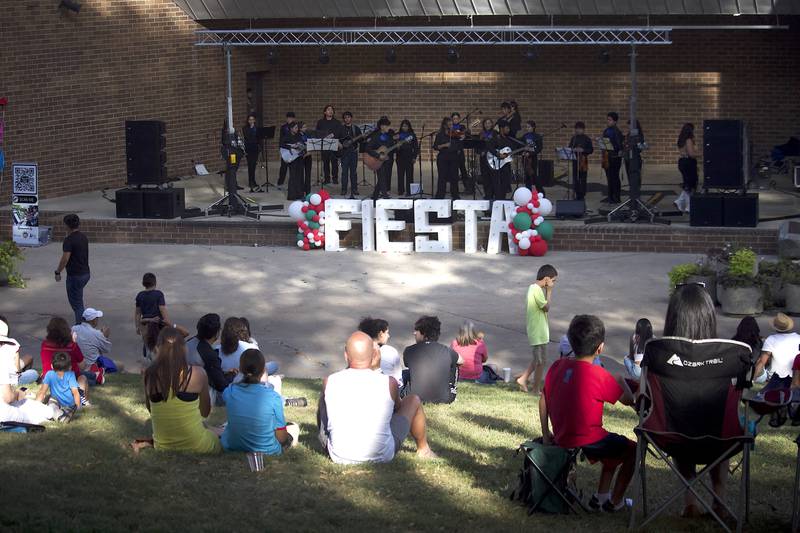 An audience watches Mariachi de Joliet play at the Fiesta en el Bicentennial Park at Saturday, Sept. 14, 2024 at Billie Limacher Bicentennial Park in Joliet. The community band is mainly comprised of Joliet area students.