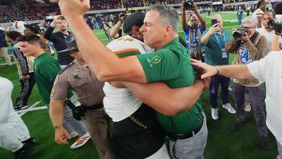 Miami beats defending national champ Ohio State 24-14 in the CFP quarterfinal at Cotton Bowl