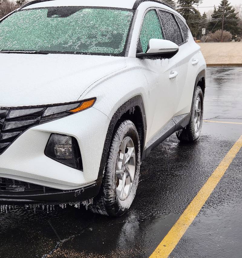 Northwest Herald reader Bobbie Haefke's car completely encased in about 1/8-inch sheet of ice by about 3:30 p.m. Wednesday, Feb. 22, 2023, during an ice storm in Marengo.