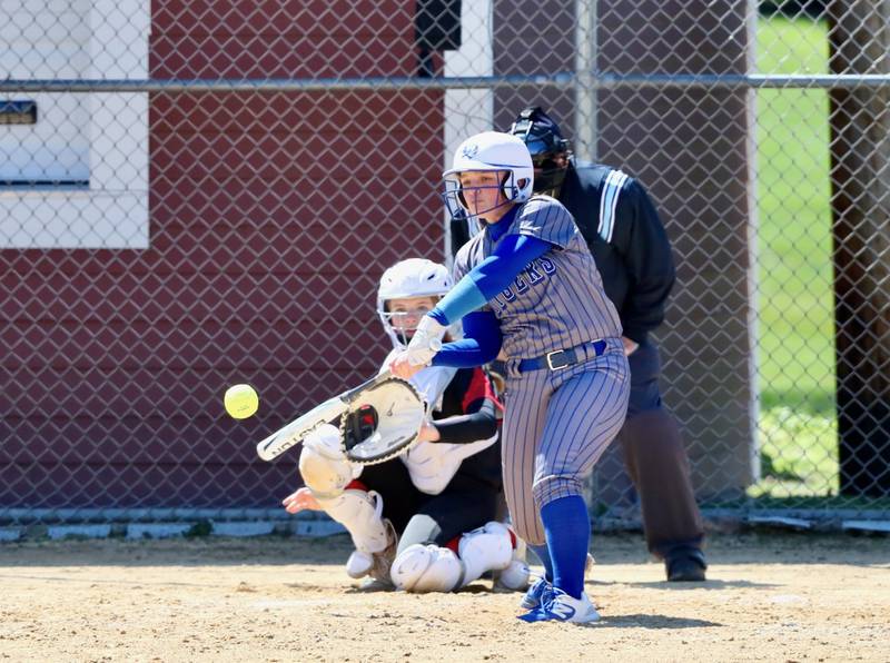 Princeton's Avah Oertel connects on a home run Saturday at Hall.