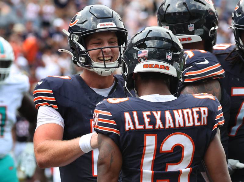 Chicago Bears quarterback Tyson Bagent celebrates with wide receiver Maurice Alexander after they hooked up on a touchdown pass Sunday, Aug. 10, 2025, during their preseason game against the Miami Dolphins at Soldier Field in Chicago.