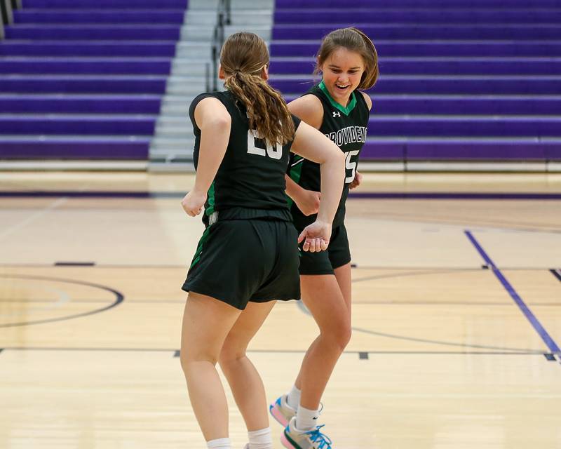 Providence's Gabi Bednar (20) and Abbey O'brien (15) during pregame introductions before the the WJOL Tournament Championship game. Nov 18, 2023.