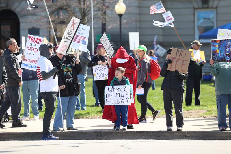 Protesters participate in the No Kings rally at the Kankakee County Courthouse on March 28, 2026.
