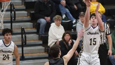 Photos: Marquette vs. Midland boys basketball in the Tri-County Conference Tournament 