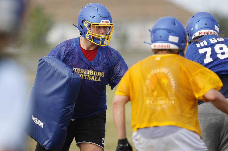 Johnsburg's Jacob Welch works on defensive drills during football practice at Johnsburg High School on Tuesday, Aug. 10, 2021 in Johnsburg.