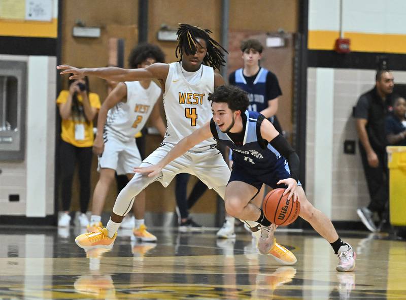 Plainfield South's Jay Pena (4) tries to drive to the basket during a conference game against Joliet West on Friday, Dec. 01, 2023, at Joliet. (Dean Reid for Shaw Local News Network)