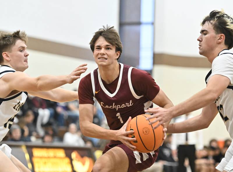 Lockport's Trace Schaaf drives to the basket during the WJOL tournament championship game against Lemont on Saturday, NOV. 29, 2025, at Joliet.