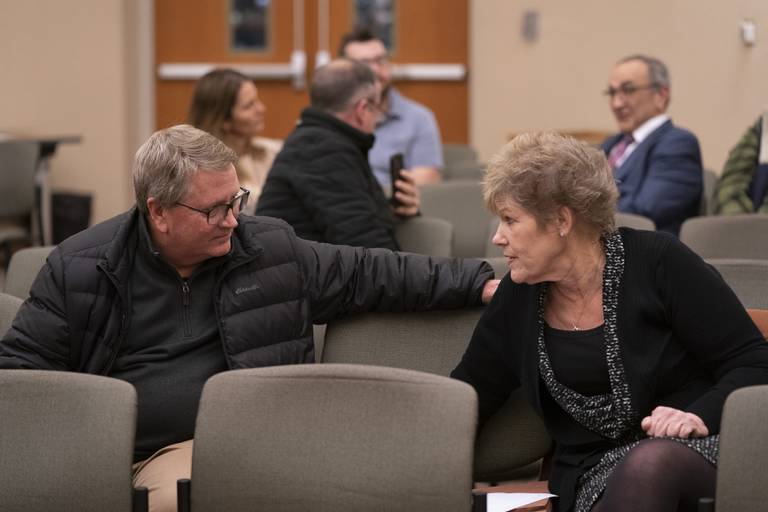 Incumbent City Council members Brett Hopkins and Ellen Brady speak together during a hearing of the Crystal Lake Municipal Officers Electoral Board for hearing and passing upon of objections to nomination papers for candidates for Mayor and City Council at City Hall on Thursday, December 15, 2022. Ryan Rayburn for Shaw Local