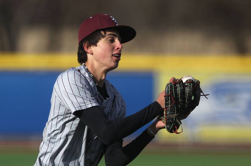Richmond-Burton's Grayson Morningstar makes a catch during a Kishwaukee River Conference baseball game against Johnsburg on Monday, April 6,2026, at Johnsburg High School.