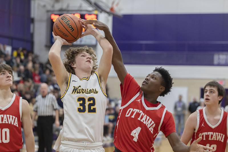 Sterling’s Brecken Peterson puts up a shot against Ottawa’s Kevin Peterson in the regional final Friday, Feb. 24, 2023.