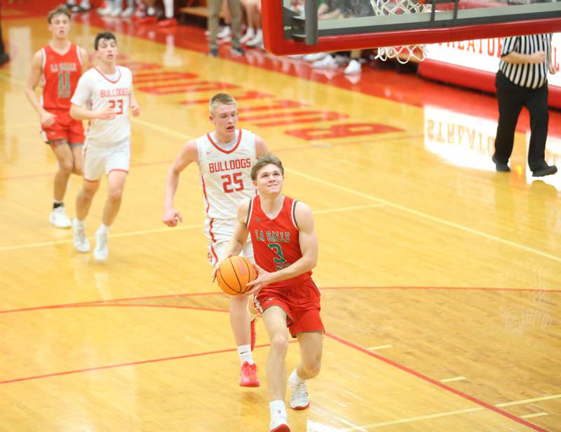 L-P's Braylin Bond scores on a break away on against Streator on Tuesday, Jan. 13, 2026 in Pops Dale Gymnasium at Streator High School.