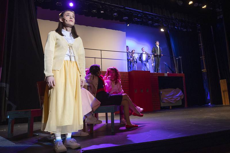 Leads Olivia Payne and Owen Winters rehearse the song Summer Loving Wednesday, March 12, 2025, for Dixon High School’s winter musical Grease.