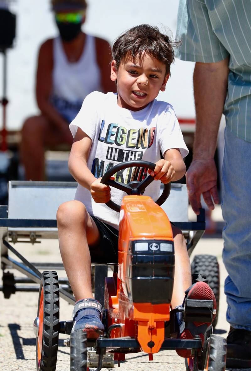 Kids were able to drive around individual tractors during Beef and Ag Days.