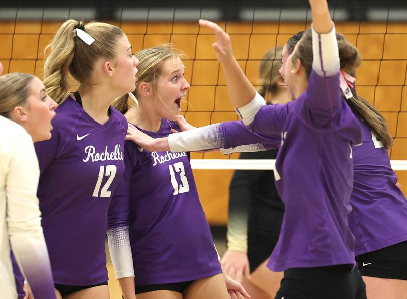 Rochelle players celebrate a point against Sycamore Tuesday, Oct. 28, 2025, during their Class 3A regional semifinal match at Rochelle High School.
