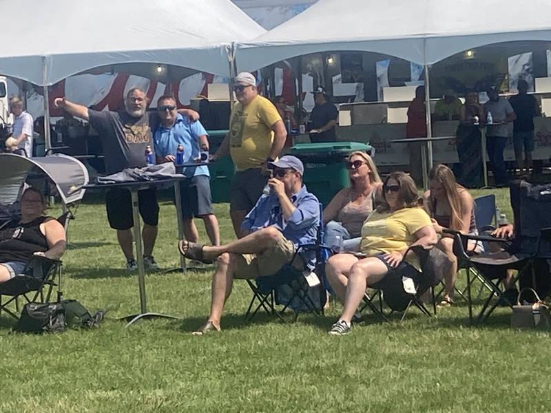 Guests at the Shorewood Crossroads Festival watch musical performances by School of Rock students on Saturday, August 2, 2025.