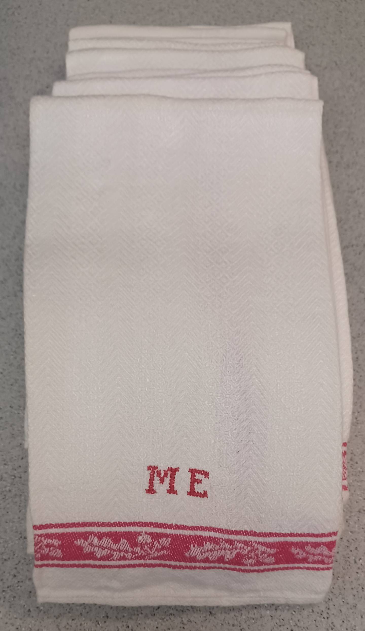 Linens embroidered with initials M.E. for Maia Erikson, an aunt who helped raise Ingrid Rowlett’s mother, Maj-Lis. Rowlett plans to donate these linens to the Geneva History Museum as well.