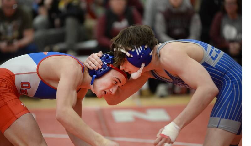 Oregon’s Nelson Benesh (left) and Newman’s Landon Blanton start their match at 132 pounds during the opening night of the 1A Oregon Sectional on Friday, Feb. 14, 2025.