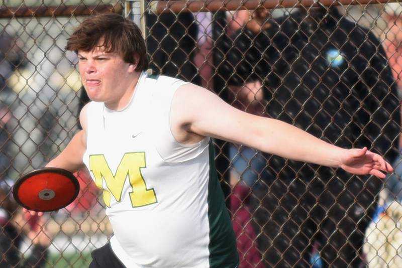 Bishop McNamara's Cale Hamilton throws the discus at the Herscher Invite Friday, May 1, 2026.