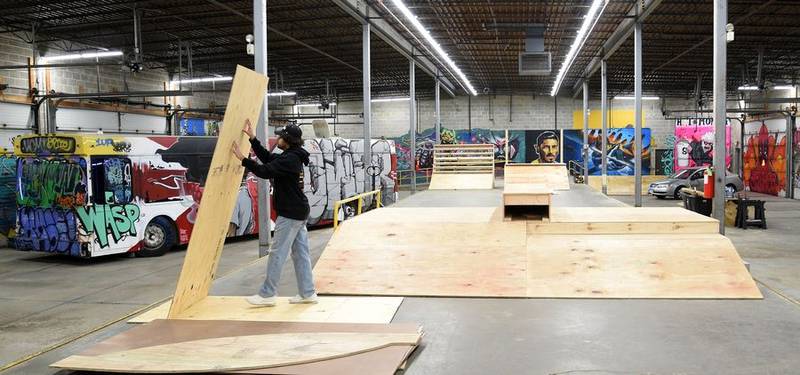 Ian Nathan Jr., with help from his dad, is opening an indoor skate park in a 13,500-square-foot vacant space at the McLean Plaza Shopping Center in Elgin. The skating area was a loading dock and storage area for a former Sara Lee Bakery store.