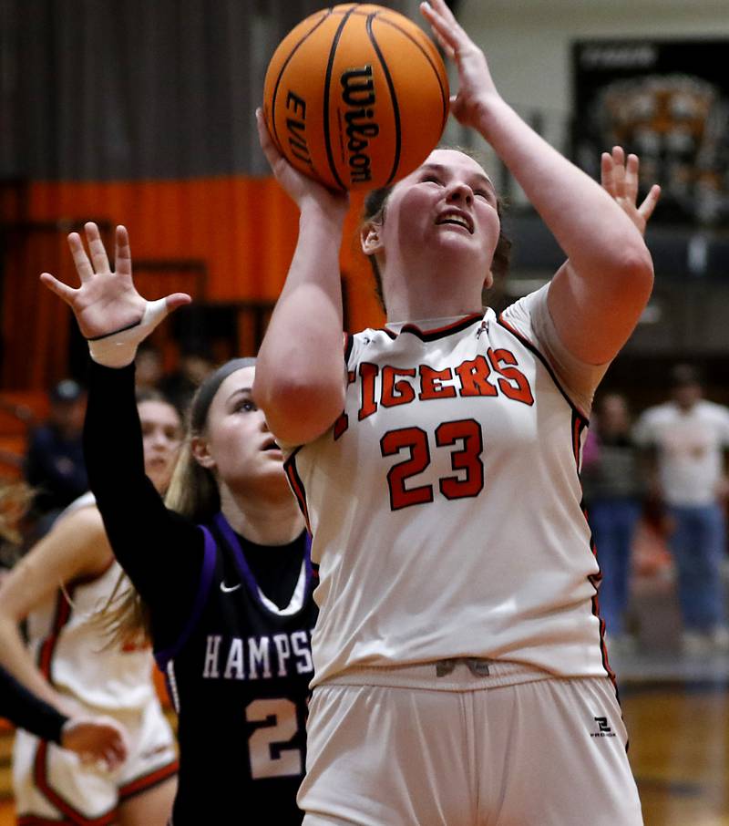 Crystal Lake Central's Leah Spychala shoots the ball in front of Hampshire's Chloe Van Horn during a a Fox Valley Conference basketball game on Friday, Feb. 7, 2025, at Crystal Lake Central High School.