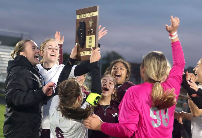 Marengo’s Indians celebrate a 3-2 OT win over Richmond-Burton in IHSA Class 1A Regional Title Game action soccer at Marengo High School in Marengo on Wednesday, May 21, 2025.