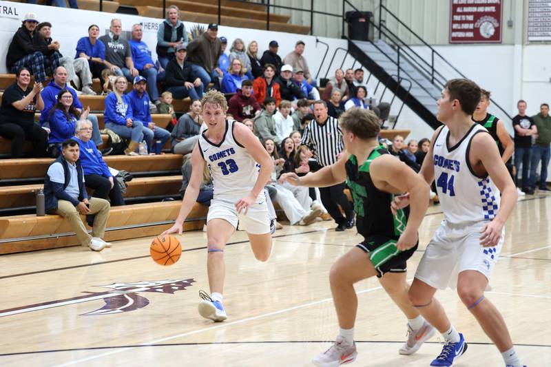 Clifton Central's Jake Thompson drives toward the basket as Bishop McNamara's Ian Irps steps to defend him during the Fightin' Irish's 62-41 victory in the Watseka Holiday Tournament championship on Tuesday, Dec. 16, 2025.