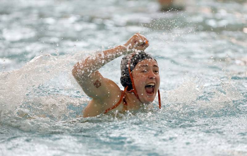 Hersey's Clare Corley (23) celebrates a goal during the IHSA State Water Polo consolation match Saturday May 20, 2023 at Stevenson High School in Lincolnshire.