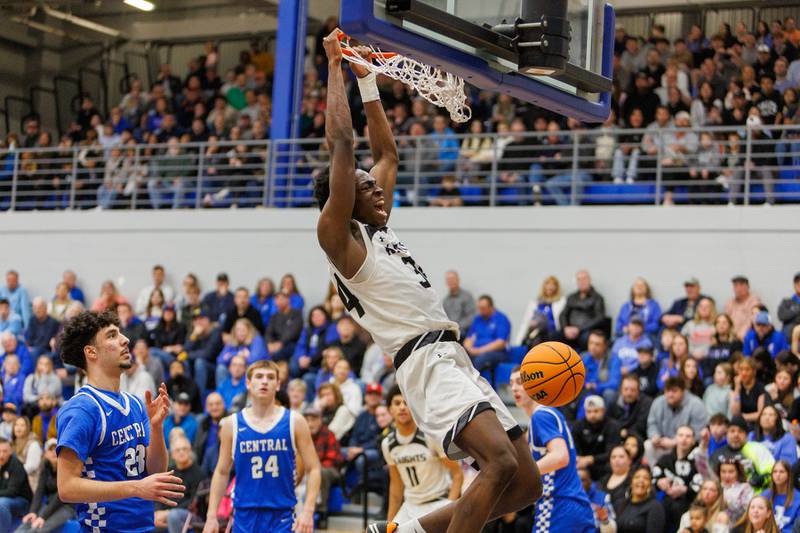 Kaneland's Jeffery Hassan with a slam dunk near the end of the forth quarter against Burlington Central at the Class 3A Burlington Central Regional Final on Friday, Feb. 27,2026 in Burlington.