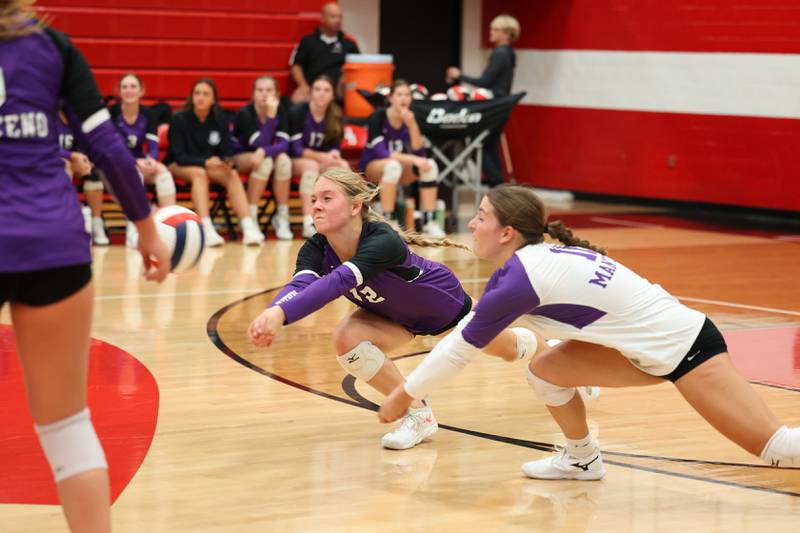 Manteno's Maddy Belisle, left, and Morgan Derrico both dive for a dig against Bradley-Bourbonnais' during the Panthers' victory in three sets, 25-21, 23-25, 25-17, over the Boilermakers on Monday, Sept. 15, 2025.