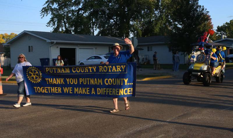 Putnam County Rotary Club walks during the inaugural Homecoming parade on Wednesday, Sept. 17, 2025 down Elm Street in Granville.