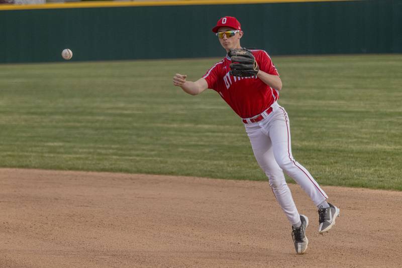 Ottawa's Lucas Farabough makes an off balance throw to first for the out in the game against LaSalle Peru on April 22, 2024 at the L-P Athletic Complex.