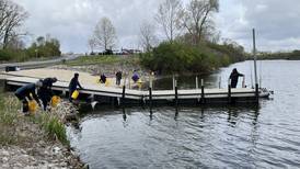 Volunteers clean up plastic pollution at Joliet nature preserve for Earth Day